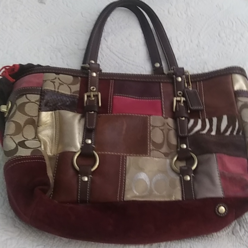 Coach mulitpatchwork suede and leather gold tone metal accent brown leather hand